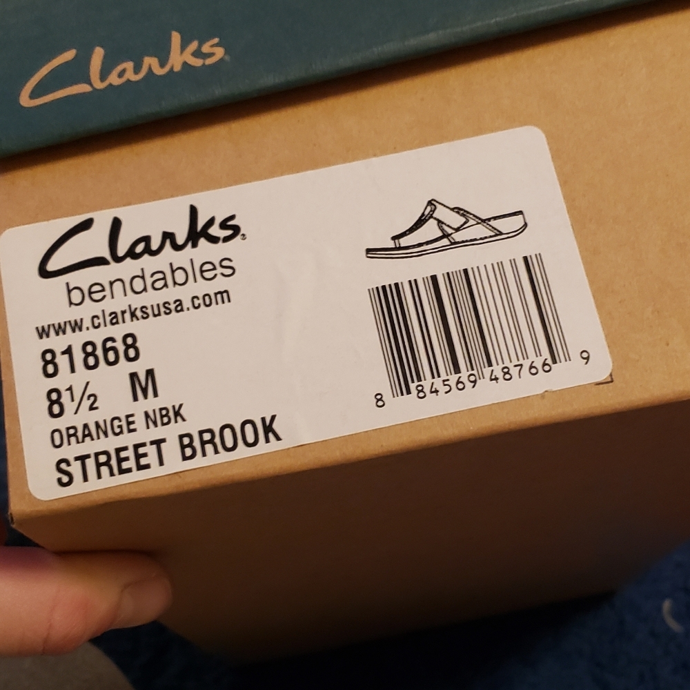 Clarks brand new orange slip ins